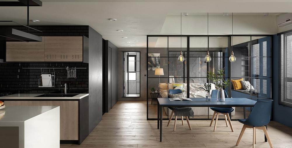 Ảnh chụp từ phía cửa vào căn hộ, bên trái là bếp, bên phải là bàn ăn, tiếp theo là vách ngăn kính, bên trong là phòng ngủ vách ngăn phòng ngủ và phòng ăn