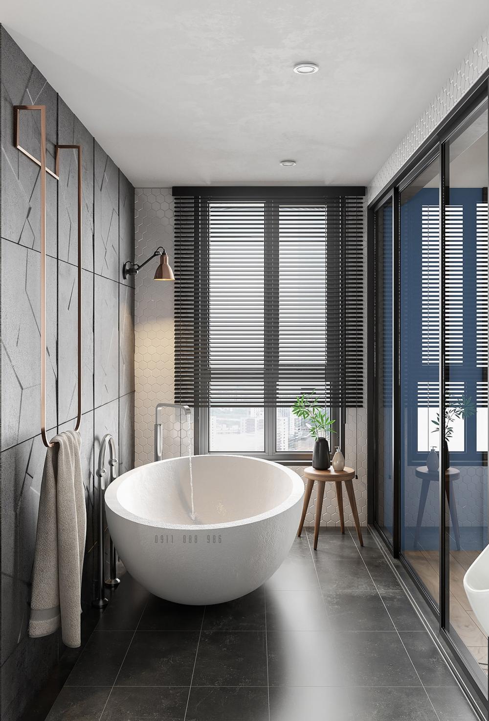 Phòng tắm lát gạch màu đen, bồn tắm tròn màu trắng, bên phải là vách kính, phía trong là cửa sổ rèm lá sách trang trí phòng tắm