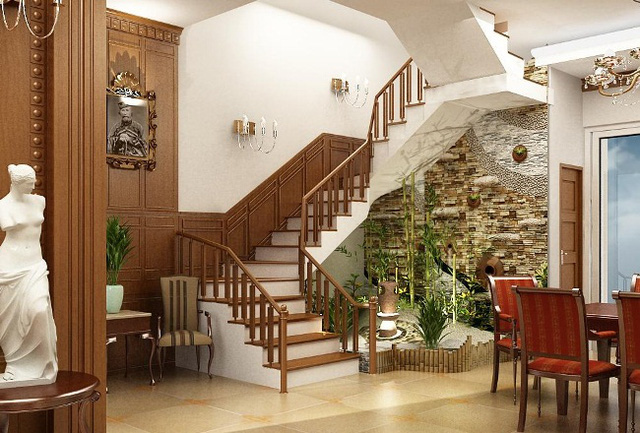 Ảnh chụp tiểu cảnh nhỏ nơi góc gầm cầu thang, được rải sỏi trắng, trồng cây tre nứa và hàng rào gỗ nhỏ đẹp mắt bài trí tiểu cảnh đẹp