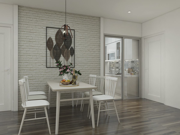 Trong ảnh là khu vực ăn uống của gia đình được bố trí gọn vào một góc nhà với bộ bàn ăn màu trắng, hợp mệnh Thủy của gia chủ Khu vực ăn uống của nhà phố