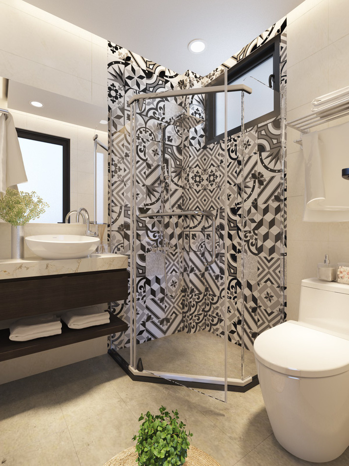 Ảnh chụp phòng tắm và vệ sinh thiết kế hiện đại với mảng ốp tường gạch hoa họa tiết đen - trắng nổi bật Tư vấn thiết kế nhà ống trên đất hẹp