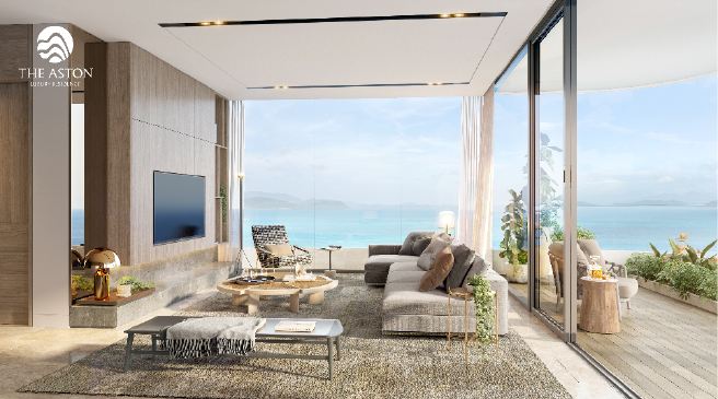 A living room with a view of the oceanDescription automatically generated with low confidence