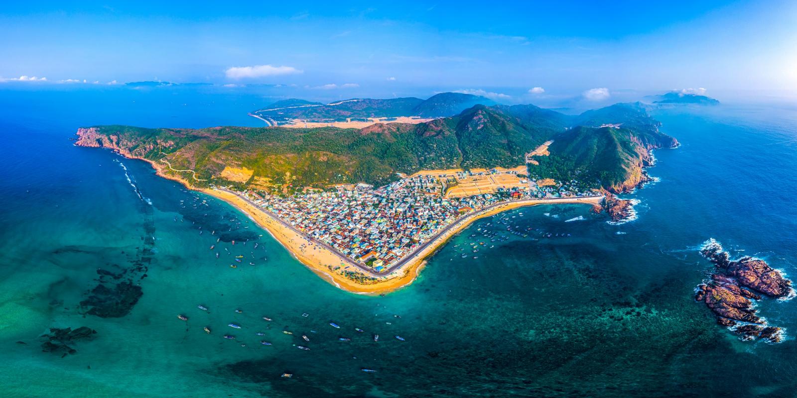 An aerial view of a small islandDescription automatically generated with low confidence