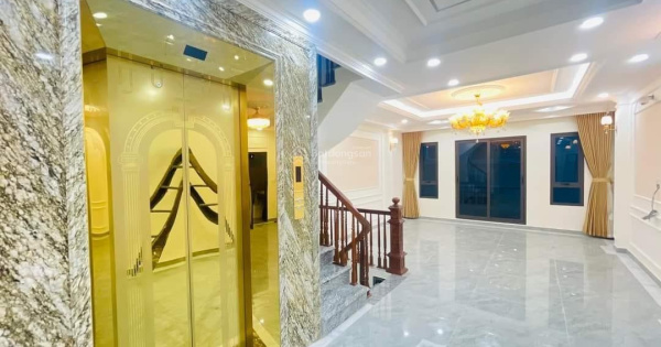 Nhà đẹp như hình - xây mới. Phân lô - ô tô - phố Nguyễn Văn Huyên, 55m2 7 tầng thang máy. MT: 5m